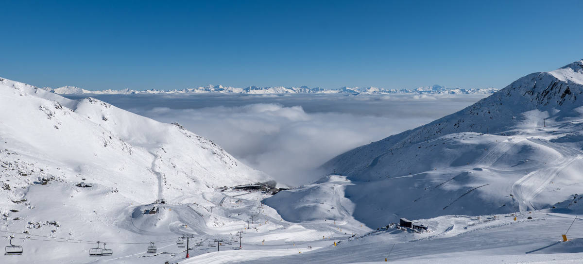 The Remarkables ski field above the clouds Queenstown New Zealand